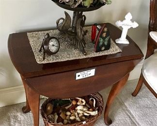 One of 2 vintage drop leaf tables