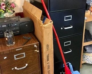 Large 4 drawer filing cabinet.