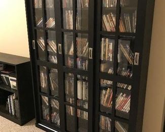 Media Case (2 of 2) - 47"W x 9"D x 62"H - 3 Sliding Doors, Dark Stained Oak (Contents Not Included) $187  (orig. $250)