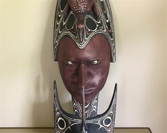 Carved mask with puma shell eyes 28” H X 9” W $168 (orig. $225)