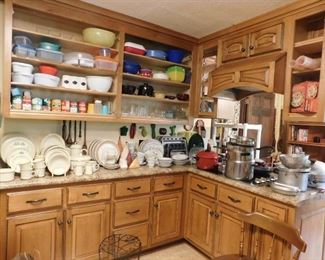 Kitchen Full. Sets of stoneware, pots and pans