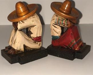 Lot #29, small wooden carved resting pair with sombreros, $ 12 for the pair