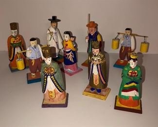Lot #31, 9 wooden carved Asian figurines, $24