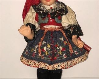 Lot #38 ethnic doll with red scarf, $14