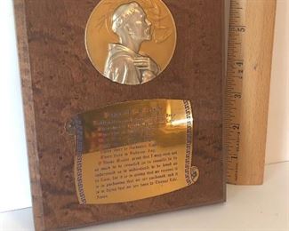 Lot #124 larger St Francis plaque, $8