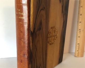 Lot #146 bible with wood cover, $6