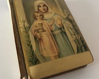 Lot #167 well loved communion prayer book, $6