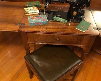 Lot #227 Singer sewing machine with all the accessories and bench, $100