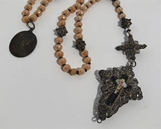 Lot #251 antique filigree rosary, side shown has crack in enamel other side with Jesus is perfect, $80  