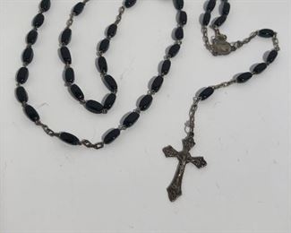 Lot #259 marked Roma rosary, $8
