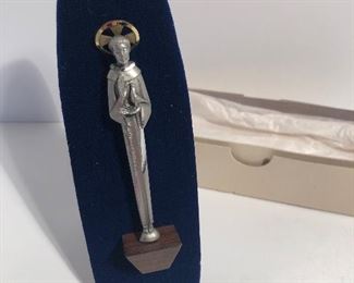 Lot #312 pewter figure on velvet stand in box, $8