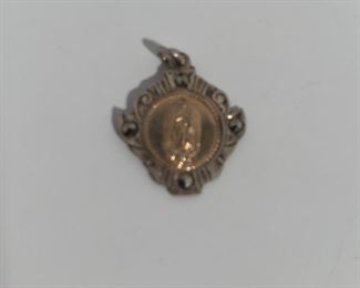 Lot #321 small medal marked 950, $18