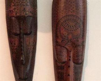 2 carved masks