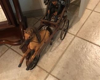 old toy horse with buggy and rider