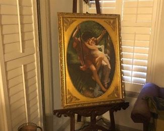Gilded frame art, wood easel