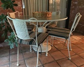 Dynamic Glass Top Patio Table & Four Matching Chairs 390