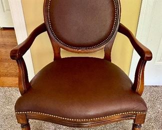 Leather studded arm chair