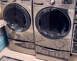 Stainless Front loading washer and dryer with pedestals. Homeowners have a greed to sell during the sale under the condition they are picked up in another week or two. They will be living in the house until there moving date.