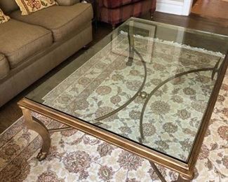 Kravet Furniture “Giselle” Antique Gold & Glass Cocktail Table; 54” L x 36”W x 19” h,
Condition: some use scratches on glass, small corner chip Asking $500