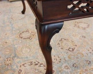 Custom traditional cocktail table, Fretwork design on sides, glass top, pad feet, 45” square Asking $1200
