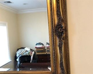 Beveled glass wall hung mirror with gilt frame, 46” x 34”. Asking $175