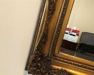 Beveled glass wall hung mirror with gilt frame, 46” x 34” Asking $175