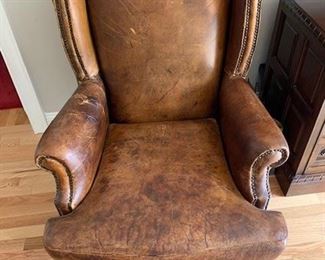 BROWN LEATHER STUDDED READING CHAIR $165