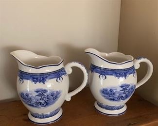 PAIR OF BLUE/WHITE PITCHERS $48