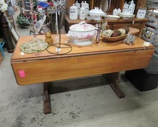 Great drop leaf table think it is pecan
