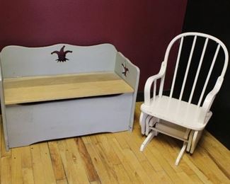 Toy chest bench and rocker	
Toy chest is wood with jester cut-outs. Child size rocker glider