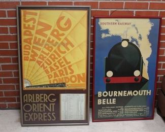 Framed train posters	
Frames are plastic. Yellow poster was folded at one time then framed.