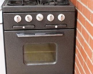 Apartment size stove/range - grey	
Gas. Doors are a little loose and don't open as well. Needs to be cleaned and an a little work.