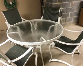 Outdoor Table with Four Chairs https://ctbids.com/#!/description/share/409607