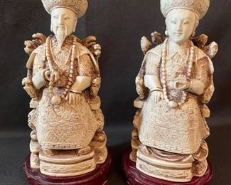 	Asian Item 22	
Resin Asian emperor & empress figurine set on wooden pedestal; Note: see photos