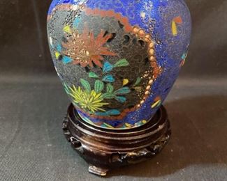	Asian Item 30	
Ceramic cloisonne like 4" pot on wooden pedestal; Note: see photos