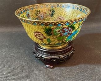 	Asian Item 32	
Metal Cloisonne 5"dia shallow bowl on wooden pedestal; Note: see photos