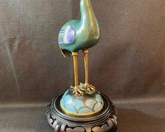	Asian Item 40	
11" metal Cloisonne bird on wooden pedestal; Note: see photos
