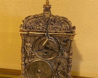 Shelf clock 11 1/2"h x 6" w x 3 1/2"d ornate gold clock with key;  Note:  see photos