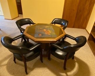 42" dia hexagon wood table with glass top, puzzle included.  Note:  see photos .  Heavy bring help to remove and load
