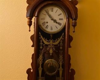 37"h x 5"d x 15" w wooden wall clock, works, key included.  Note:  see photos