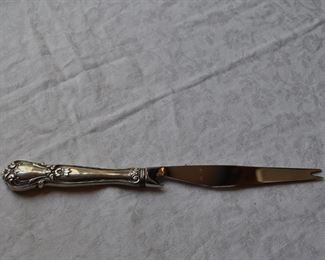 Sterling handled cheese knife: $28.00. 