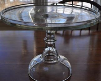 Early large molded glass cake stand. One tiny chip on bottom of top and one small chip on very bottom which doesn't show. 8 3/8" tall. Holds an 11" cake. 8 3/8" tall. $58