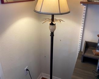 Floor lamp with palm leaves                                                                                                         Measures 62 inches high                                                                            PRICE: $40