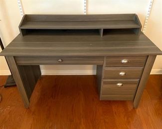 Grey toned desk with 3 drawers                                                           Measures 53L x 30Hx 23.5D                                                                PRICE: $50 or best reasonable offer