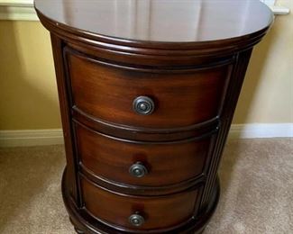 3 drawer round wood side table                                                         Measures: 19 inch diameter, 26inches high                                  PRICE: $50