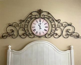 decorative wall clock in wrought iron (a king size bed is below clock)                                                                                 Measures 103 inches x 38 inches                                                         PRICE: $75