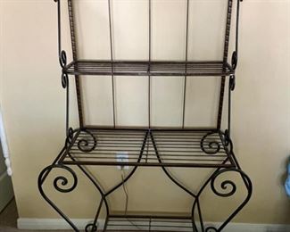 Currently in invoice. 
Wrought Iron bakers rack                                                                      Measures 64.5H x 36W x 15.5D                                                           PRICE: $60                                                   
