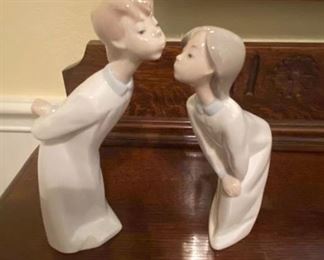 Pair of LLadro figurines-boy and girl in nightgowns kissing                                                                                               PRICE: $25 pair 
