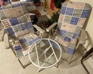 2 patio folding chairs and folding table                                         PRICE: $20