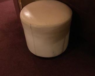 White Leather Ottoman (fair condition, some apparent wear).  Diameter=18.5in x H=18.5 in